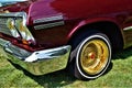 Classic Car with golden tire rims and chrome