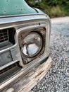 Classic car image of vintage headlight with a gravel background. Royalty Free Stock Photo