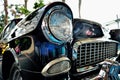 Classic car rear lights with rusty bumper Royalty Free Stock Photo