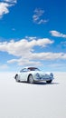 classic car in a stunning desert landscape with expansive blue skies above. Royalty Free Stock Photo