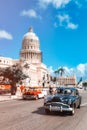 Classic  cars in downtown Havana next to the Capitol building Royalty Free Stock Photo