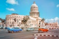 Classic cars in Havana next to the Capitol building Royalty Free Stock Photo