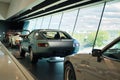 Classic cars lined up next to a window Royalty Free Stock Photo