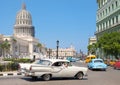 Classic cars near the Capitol building, a symbol of Havana