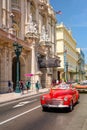 Classic cars next to the Great Theater and famous hotels in Old Havana