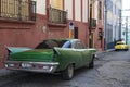 Classic cars in street of Santiago de Cuba Royalty Free Stock Photo