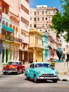 Classic cars at sunset in downtown Havana