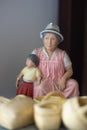 Classic ceramic ornament of elderly woman with child