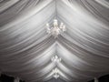 Classic chandeliers on party tent