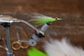 Classic chartreuse color Clouser Minnow streamer fly Royalty Free Stock Photo