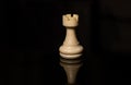 Classic Chess White Rook on black board, isolated Royalty Free Stock Photo