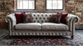 Classic Chesterfield sofa with tufted back and decorative pillows Royalty Free Stock Photo
