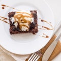 Classic chocolate dessert with a cup of coffee - brownies and ice cream Royalty Free Stock Photo