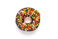 Classic chocolate donut decorated with colorful sprinkles isolated on white background Flat lat lay Top View Knolling Unhealthy Royalty Free Stock Photo