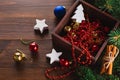 Classic Christmas toy balls with sparkles in a vintage wooden box