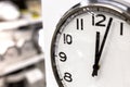 Classic circle clock with clock hands showing twelve hours. Time management, procrastination, productivity concept