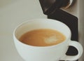 Classic coffee made with espresso machine at home Royalty Free Stock Photo