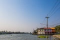 Classic colour building beside river and sky