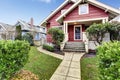 Classic craftsman old American house exterior in red and white. Royalty Free Stock Photo