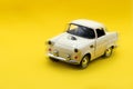 Classic, cream-colored, miniature car model