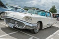 A classic cream Ford Thunderbird