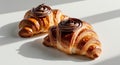 Classic croissants with chocolate hazelnut spread swirled into t Royalty Free Stock Photo