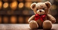 Classic cute stuffed teddy bear with red bow with blurred bokeh background, cute present romantic Valentines gift Royalty Free Stock Photo