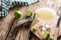 Classic daiquiri cocktail in glass on rustic wooden table Royalty Free Stock Photo