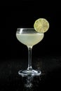 Classic daiquiri on the dark background. Luxury craft drink. Royalty Free Stock Photo