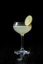 Classic daiquiri on the dark background. Luxury craft drink. Royalty Free Stock Photo