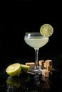 Classic daiquiri on the dark background. Luxury craft drink. Royalty Free Stock Photo