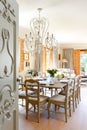 Classic, decoraive style dining room overlooking garden