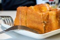 Classic dessert in Hong Kong tea restaurant, deep-fried western toast with condensed milk and peanut sauce