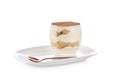 Classic dessert tiramisu in a glass. Isolate on a white background