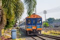 Classic diesel trains transport passengers and tourists in Thailand