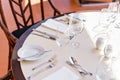 Classic Dinnerware in the restaurant. Table appointments for dinner on terrace Royalty Free Stock Photo