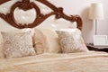 Classic double bed with wooden decor,