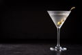 Classic Dry Martini with olives on black background Royalty Free Stock Photo