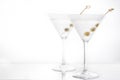 Classic Dry Martini with olives isolated on white background. Royalty Free Stock Photo