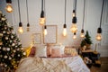 Classic Edisson bulbs with christmas bokeh backgound. Retro style bulbs. Royalty Free Stock Photo