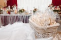 Classic and elegant wedding presidium and tables decor with blue cloth and bright blue and green flowers