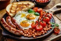 A classic English breakfast with fried eggs, sausages, baked beans, and grilled tomatoes