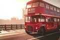 Classic English Red Bus on the Westminster Bridge and Big Ben Tower in the background Royalty Free Stock Photo