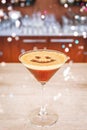 Classic Espresso Martini cocktail at the bar. Luxury resort, restaurant, bar, vacation concept Royalty Free Stock Photo