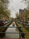 Amsterdam Canal on a Cloudy Day Royalty Free Stock Photo