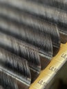 Classic eyelash extension. A palette of artificial eyelashes in close-up. Macrophotography of eyelashes for extension Royalty Free Stock Photo