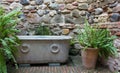 Classic Fountain Beside a Medieval Wall Royalty Free Stock Photo