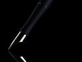 Classic fountain pen on black background. 3d rendering illustration. Fountain pen closeup.