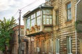 Classic Georgian style Old wooden balcony on the street of Tbilisi old town