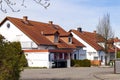 Classic german residential houses with orange roofing tiles and Royalty Free Stock Photo